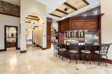One-of-a-kind 6BD/5BA/2HB Mediterranean Redland Estate on 10 on Redland Golf and Country Club in Florida - for sale on GolfHomes.com, golf home, golf lot