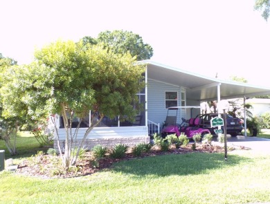 Another nice quaint 2 bedroom, front screened room for friendly on Schalamar Creek Golf and Country Club in Florida - for sale on GolfHomes.com, golf home, golf lot