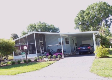 Another nice quaint 2 bedroom, front screened room for friendly on Schalamar Creek Golf and Country Club in Florida - for sale on GolfHomes.com, golf home, golf lot