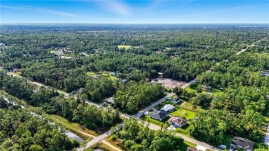Build your dream on this oversized half-acre lot in the growing on Lehigh Resort Club in Florida - for sale on GolfHomes.com, golf home, golf lot