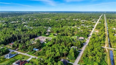 Build your dream on this oversized half-acre lot in the growing on Lehigh Resort Club in Florida - for sale on GolfHomes.com, golf home, golf lot