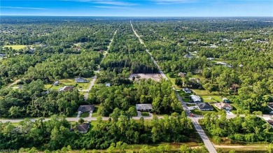 Build your dream on this oversized half-acre lot in the growing on Lehigh Resort Club in Florida - for sale on GolfHomes.com, golf home, golf lot