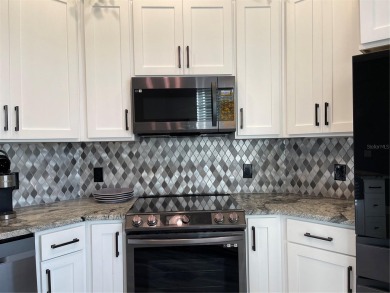 Newly Furnished and Remodeled Waterfront condo on the second on The Groves Golf and Country Club in Florida - for sale on GolfHomes.com, golf home, golf lot