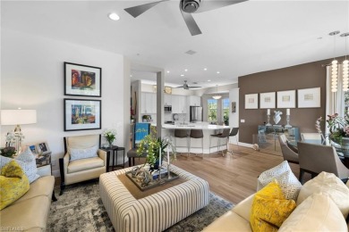 Corner end-unit, second-floor coach home filled with natural on Windstar on Naples Bay in Florida - for sale on GolfHomes.com, golf home, golf lot
