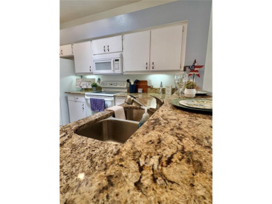 NEW PRICE TO SELL QUICKLY!  Come see this 2/2 villa-style condo on Scepter Golf Club in Florida - for sale on GolfHomes.com, golf home, golf lot