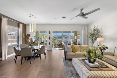 Corner end-unit, second-floor coach home filled with natural on Windstar on Naples Bay in Florida - for sale on GolfHomes.com, golf home, golf lot