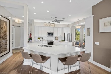 Corner end-unit, second-floor coach home filled with natural on Windstar on Naples Bay in Florida - for sale on GolfHomes.com, golf home, golf lot