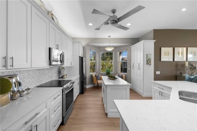 Corner end-unit, second-floor coach home filled with natural on Windstar on Naples Bay in Florida - for sale on GolfHomes.com, golf home, golf lot