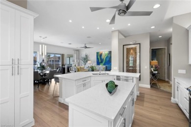 Corner end-unit, second-floor coach home filled with natural on Windstar on Naples Bay in Florida - for sale on GolfHomes.com, golf home, golf lot