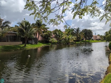 Corner lot, lake view, move in ready, light and bright home, in on Oriole Golf and Tennis Club in Florida - for sale on GolfHomes.com, golf home, golf lot