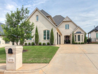 Nestled within the prestigious Oak Tree Golf and Country Club on Oak Tree National Golf and Country Club in Oklahoma - for sale on GolfHomes.com, golf home, golf lot