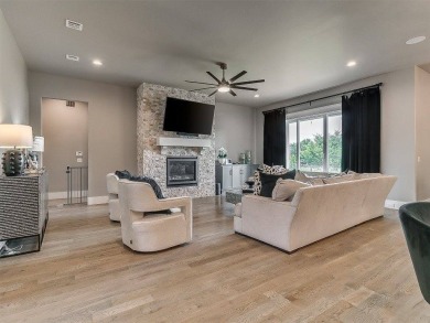 Nestled within the prestigious Oak Tree Golf and Country Club on Oak Tree National Golf and Country Club in Oklahoma - for sale on GolfHomes.com, golf home, golf lot