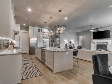 Nestled within the prestigious Oak Tree Golf and Country Club on Oak Tree National Golf and Country Club in Oklahoma - for sale on GolfHomes.com, golf home, golf lot