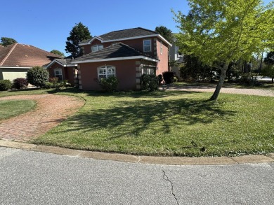 Here is your chance to purchase an affordable home in the gated on Emerald Bay Golf Club in Florida - for sale on GolfHomes.com, golf home, golf lot