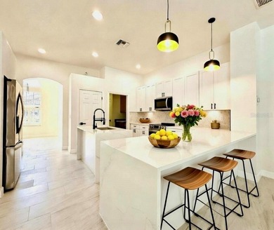 Welcome to this beautifully, fully renovated home, featuring a on Riverwood Golf Club in Florida - for sale on GolfHomes.com, golf home, golf lot