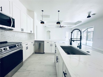 Welcome to this beautifully, fully renovated home, featuring a on Riverwood Golf Club in Florida - for sale on GolfHomes.com, golf home, golf lot