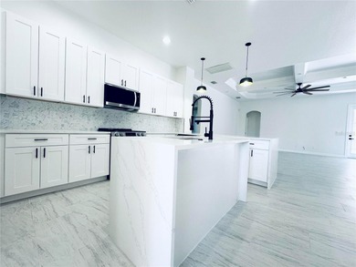 Welcome to this beautifully, fully renovated home, featuring a on Riverwood Golf Club in Florida - for sale on GolfHomes.com, golf home, golf lot