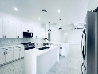 Welcome to this beautifully, fully renovated home, featuring a on Riverwood Golf Club in Florida - for sale on GolfHomes.com, golf home, golf lot