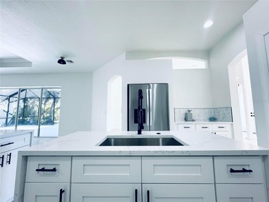 Welcome to this beautifully, fully renovated home, featuring a on Riverwood Golf Club in Florida - for sale on GolfHomes.com, golf home, golf lot