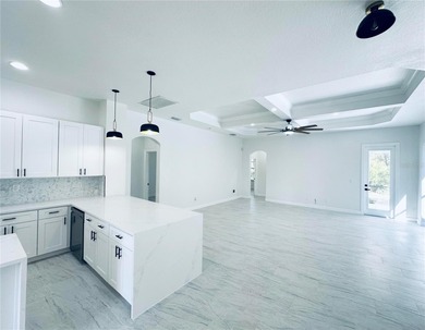 Welcome to this beautifully, fully renovated home, featuring a on Riverwood Golf Club in Florida - for sale on GolfHomes.com, golf home, golf lot