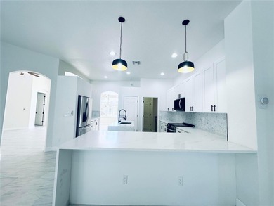 Welcome to this beautifully, fully renovated home, featuring a on Riverwood Golf Club in Florida - for sale on GolfHomes.com, golf home, golf lot