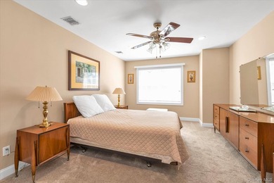 Welcome to this move in ready 2 bedroom, 2 full bath residence on The Greens At Half Hollow in New York - for sale on GolfHomes.com, golf home, golf lot