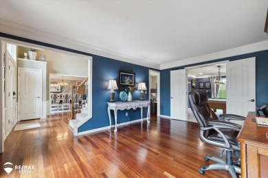 Discover luxurious lakefront living in this beautifully on Indianwood Golf and Country Club in Michigan - for sale on GolfHomes.com, golf home, golf lot