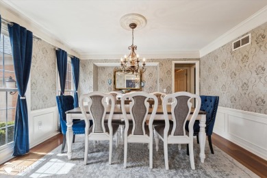 Discover luxurious lakefront living in this beautifully on Indianwood Golf and Country Club in Michigan - for sale on GolfHomes.com, golf home, golf lot