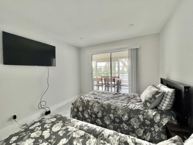 WELCOME HOME TO YOUR 2/2 TURNKEY, COMPLETELY RENOVATED on Wynmoor Golf Course in Florida - for sale on GolfHomes.com, golf home, golf lot