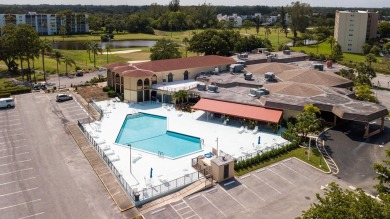 CONVENIENTLY LOCATED ACROSS FROM THE CLUBHOUSE & 2 POOLS, THIS on Poinciana Golf Club in Florida - for sale on GolfHomes.com, golf home, golf lot