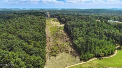 Nestled on 5 peaceful, wooded acres, this charming 2-bedroom on Wind River Golf Course in Tennessee - for sale on GolfHomes.com, golf home, golf lot