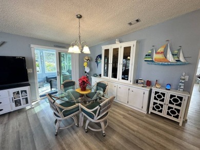 Lot Rent for this home is $1,342.00/monthly. Beautiful stucco on Del Tura Golf and Country Club in Florida - for sale on GolfHomes.com, golf home, golf lot