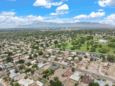 A wonderful opportunity to own a home in the UNM area with an on Puerto Del Sol Golf Course in New Mexico - for sale on GolfHomes.com, golf home, golf lot