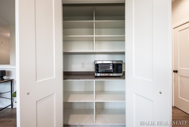 Can be Built in appx 7 months. Photos are from a previous on Sunnybrook Country Club in Michigan - for sale on GolfHomes.com, golf home, golf lot