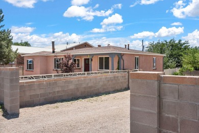 A wonderful opportunity to own a home in the UNM area with an on Puerto Del Sol Golf Course in New Mexico - for sale on GolfHomes.com, golf home, golf lot