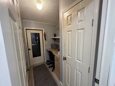 Lot Rent for this home is $1,342.00/monthly. Beautiful stucco on Del Tura Golf and Country Club in Florida - for sale on GolfHomes.com, golf home, golf lot
