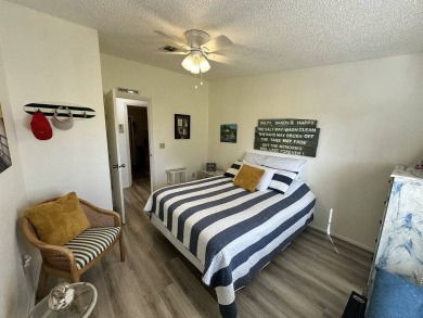 Lot Rent for this home is $1,342.00/monthly. Beautiful stucco on Del Tura Golf and Country Club in Florida - for sale on GolfHomes.com, golf home, golf lot