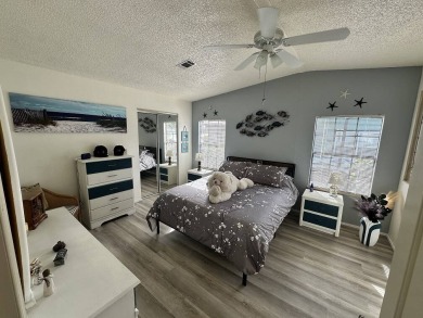 Lot Rent for this home is $1,342.00/monthly. Beautiful stucco on Del Tura Golf and Country Club in Florida - for sale on GolfHomes.com, golf home, golf lot