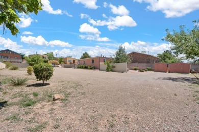 A wonderful opportunity to own a home in the UNM area with an on Puerto Del Sol Golf Course in New Mexico - for sale on GolfHomes.com, golf home, golf lot