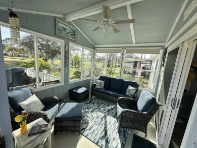 Lot Rent for this home is $1,342.00/monthly. Beautiful stucco on Del Tura Golf and Country Club in Florida - for sale on GolfHomes.com, golf home, golf lot