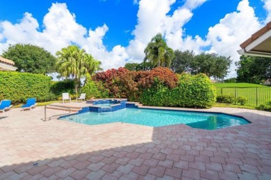 Experience the charm of this exquisite home, set on a stunning on Bocaire Country Club in Florida - for sale on GolfHomes.com, golf home, golf lot