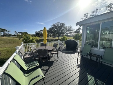 Lot Rent for this home is $1,342.00/monthly. Beautiful stucco on Del Tura Golf and Country Club in Florida - for sale on GolfHomes.com, golf home, golf lot