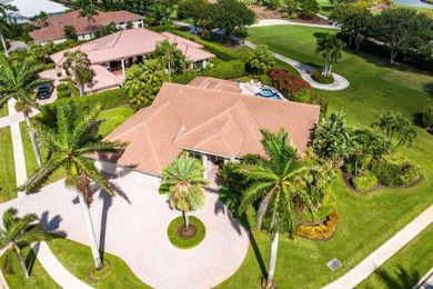 Experience the charm of this exquisite home, set on a stunning on Bocaire Country Club in Florida - for sale on GolfHomes.com, golf home, golf lot