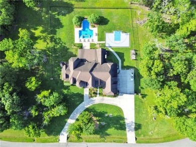 Welcome to 11 Arbor Circle, nestled within the gated community on English Turn Golf and Country Club in Louisiana - for sale on GolfHomes.com, golf home, golf lot