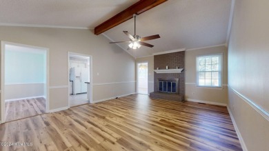 Inviting 3-Bedroom Brick Home with Sunroom Backing to the River on River Bend Golf and Country Club in North Carolina - for sale on GolfHomes.com, golf home, golf lot