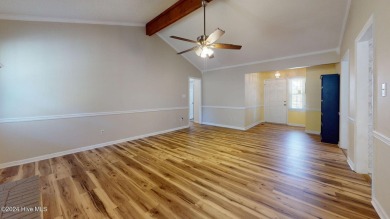 Inviting 3-Bedroom Brick Home with Sunroom Backing to the River on River Bend Golf and Country Club in North Carolina - for sale on GolfHomes.com, golf home, golf lot