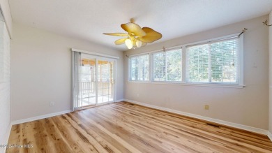 Inviting 3-Bedroom Brick Home with Sunroom Backing to the River on River Bend Golf and Country Club in North Carolina - for sale on GolfHomes.com, golf home, golf lot