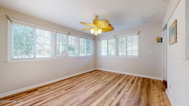 Inviting 3-Bedroom Brick Home with Sunroom Backing to the River on River Bend Golf and Country Club in North Carolina - for sale on GolfHomes.com, golf home, golf lot