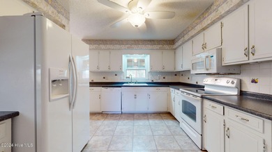 Room To Grow In! Loads of Living Space in this Brick Home with on River Bend Golf and Country Club in North Carolina - for sale on GolfHomes.com, golf home, golf lot
