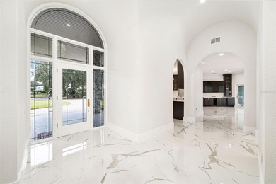 Situated on the 6th fairway along the course of Isleworth Golf & on Isleworth Golf and Country Club in Florida - for sale on GolfHomes.com, golf home, golf lot